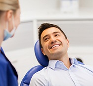 Man smiling at dentist