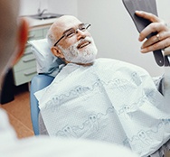 Man smiling in dental chair