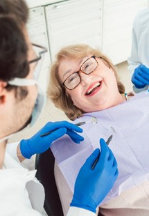 Woman smiling in dental chair