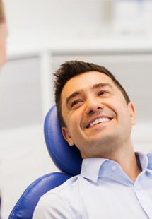 Man smiling in dental chair