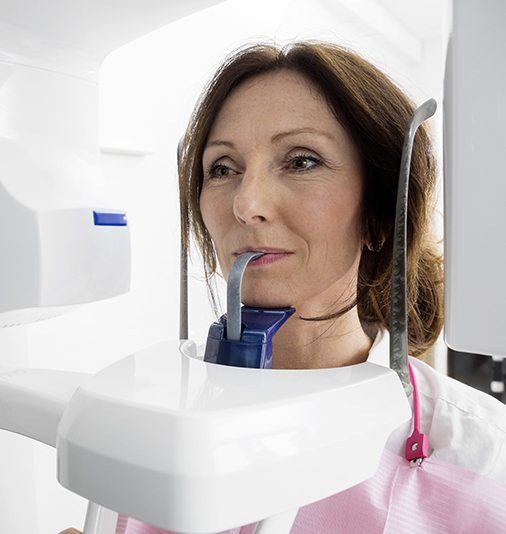 Woman receiving C T scan imaging