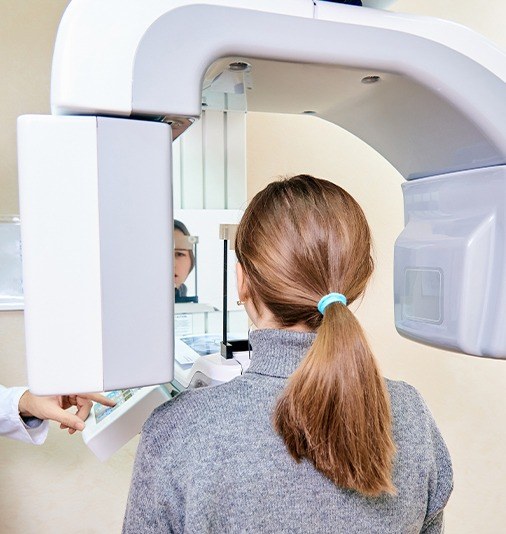 Woman receiving cone beam imaging