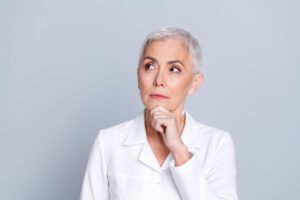 Senior woman wearing curious expression